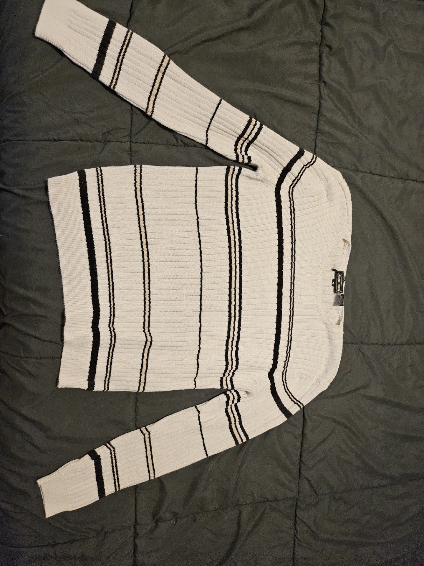 This ivory Jeanne Pierre sweater is a vintage-style piece, likely from the 1990s